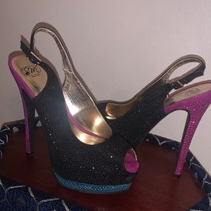 Tricolored high heels. Pink, black and teal.